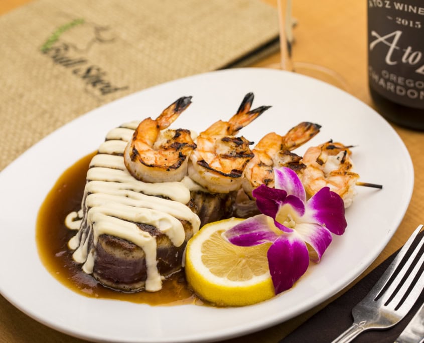 prime rib and shrimps on a skewer dinner